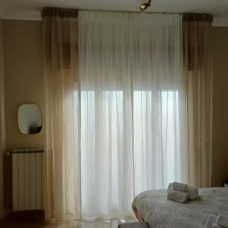 Elettra House آنسيو